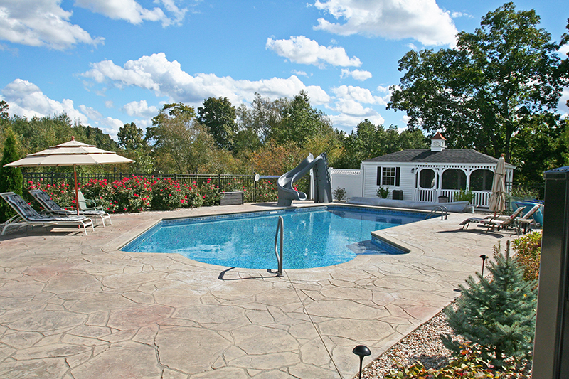 Swimming pool and stamped concrete project example 131
